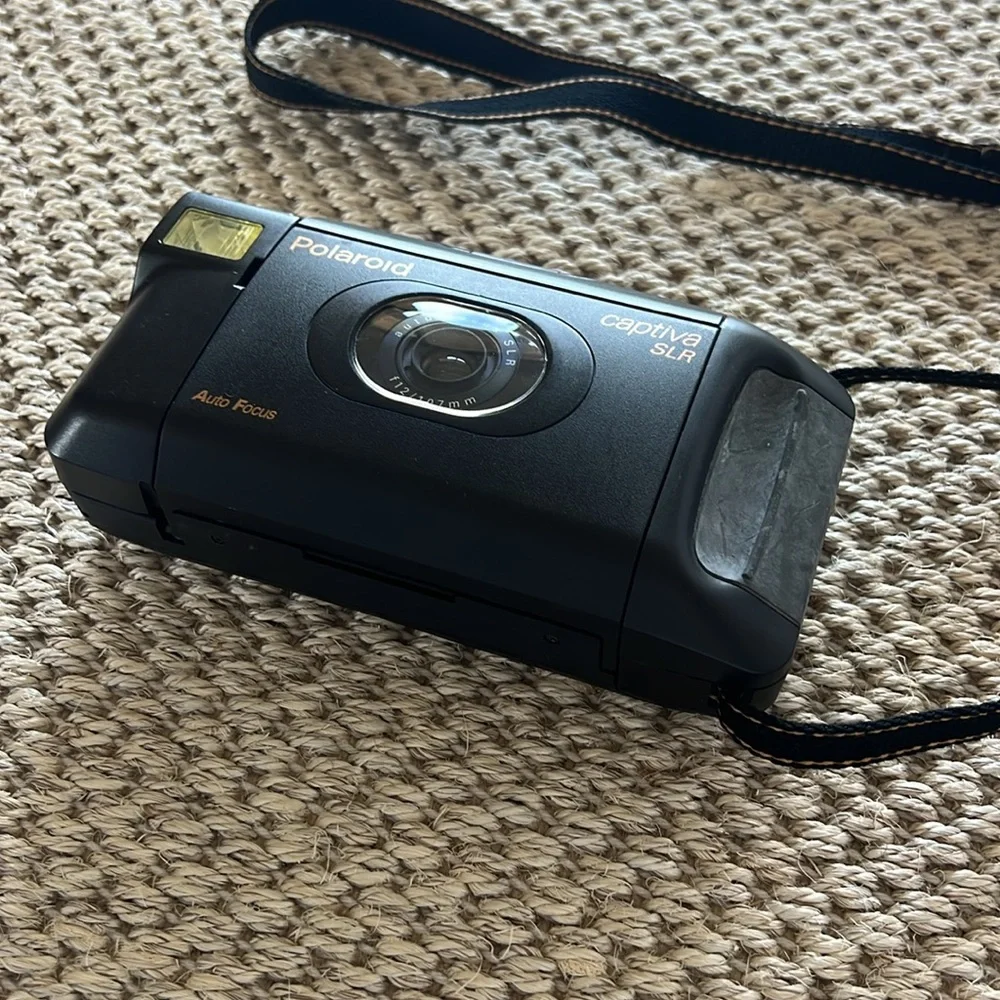 Polaroid 95 film camera captiva auto focus SLR